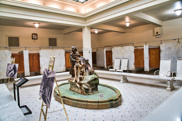 Men's Bathing Lobby, note statue and stained glass...
