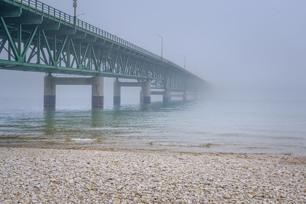 Mackinac Bridge on a foggy day - connects Michigan...