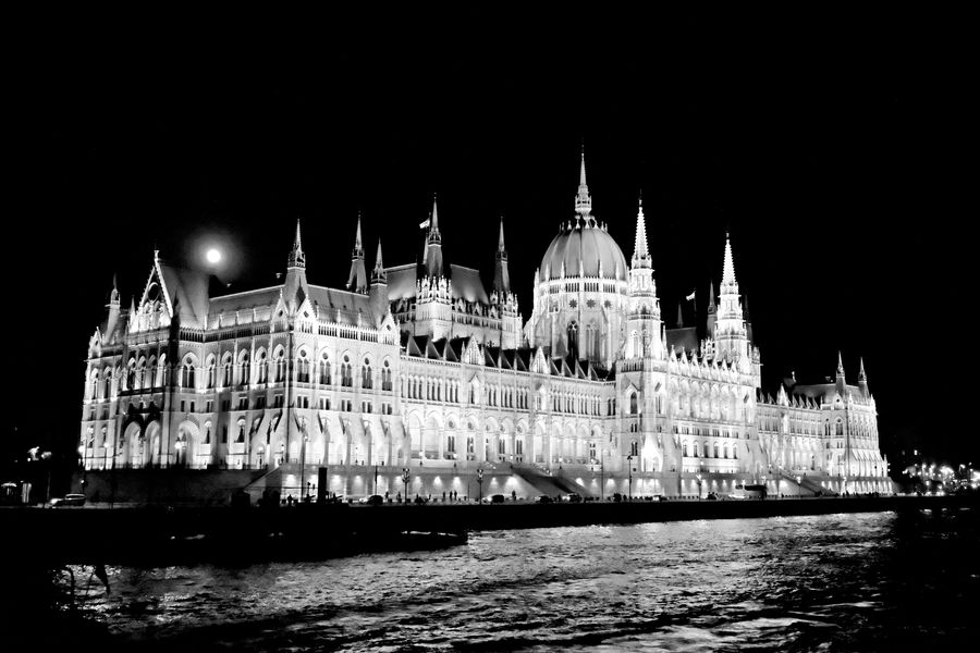 Full moon rising over the Hungarian Parliament Bui...