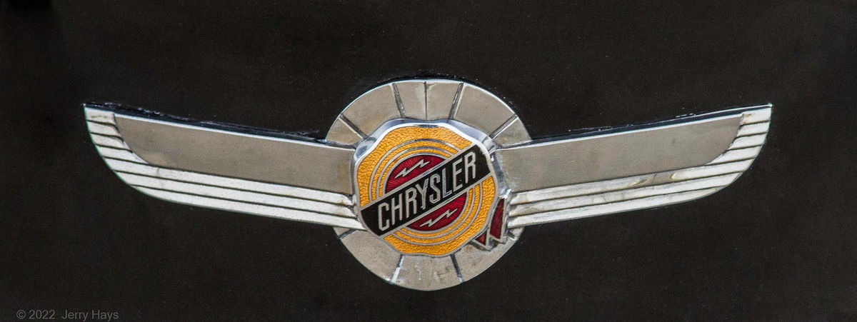 7.  Chrysler Hood Emblem...