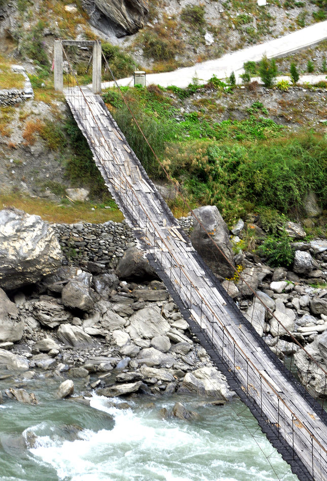 10 - A typical very basic hanging bridge crossing ...