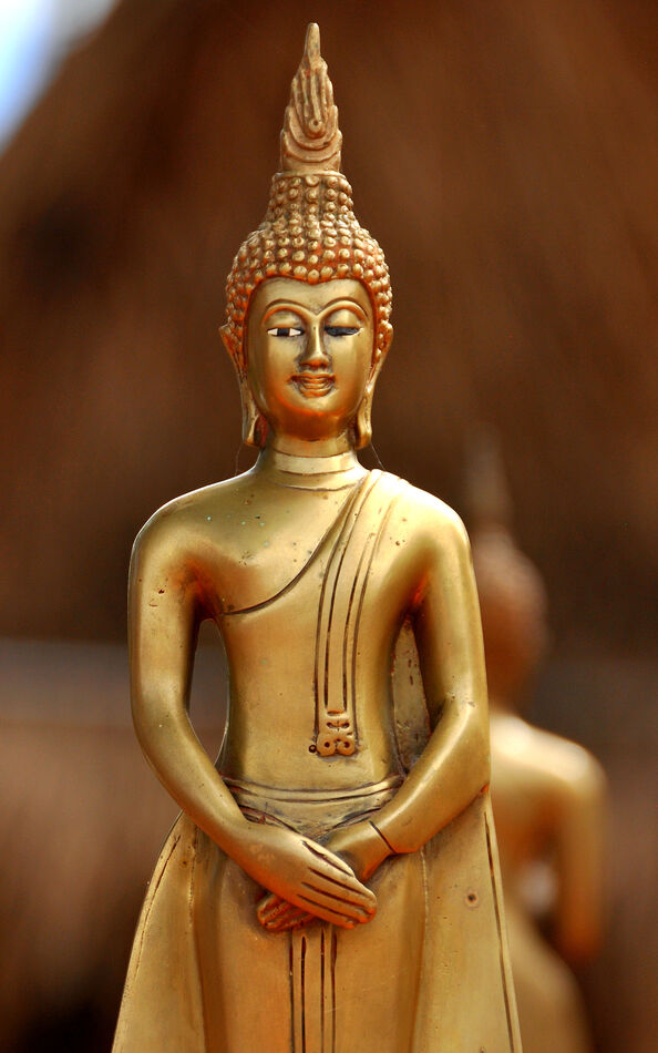 2 - Closer view of one of the Buddha statues: Stan...