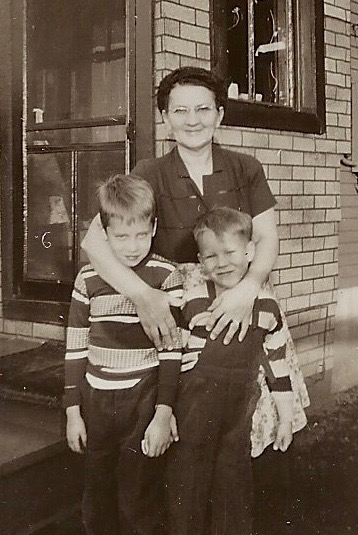 Grandma with Jim and me by her house along the Cod...
