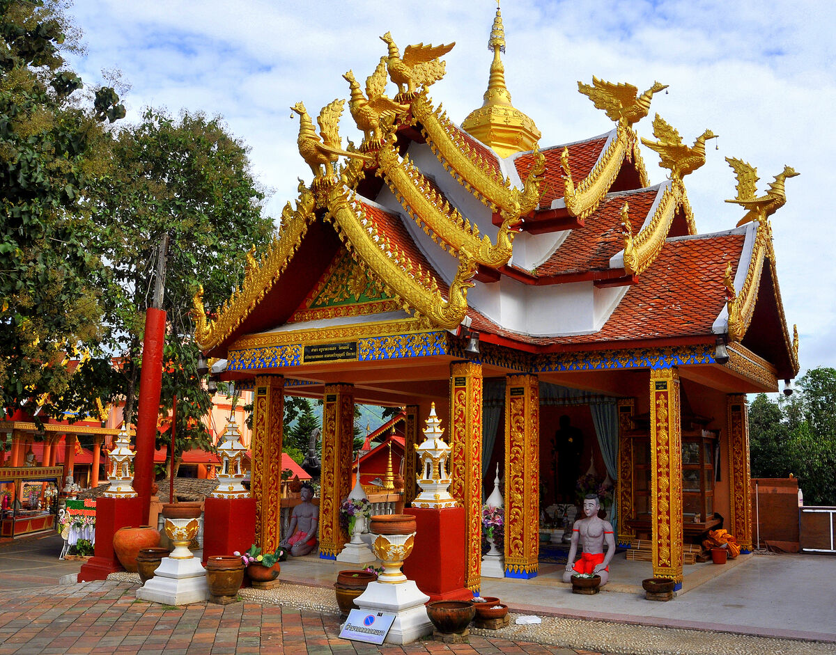 1 - An ornate side-temple, featuring golden dragon...