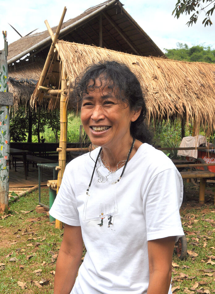 7 - The owner and resident Thai artist, who speaks...