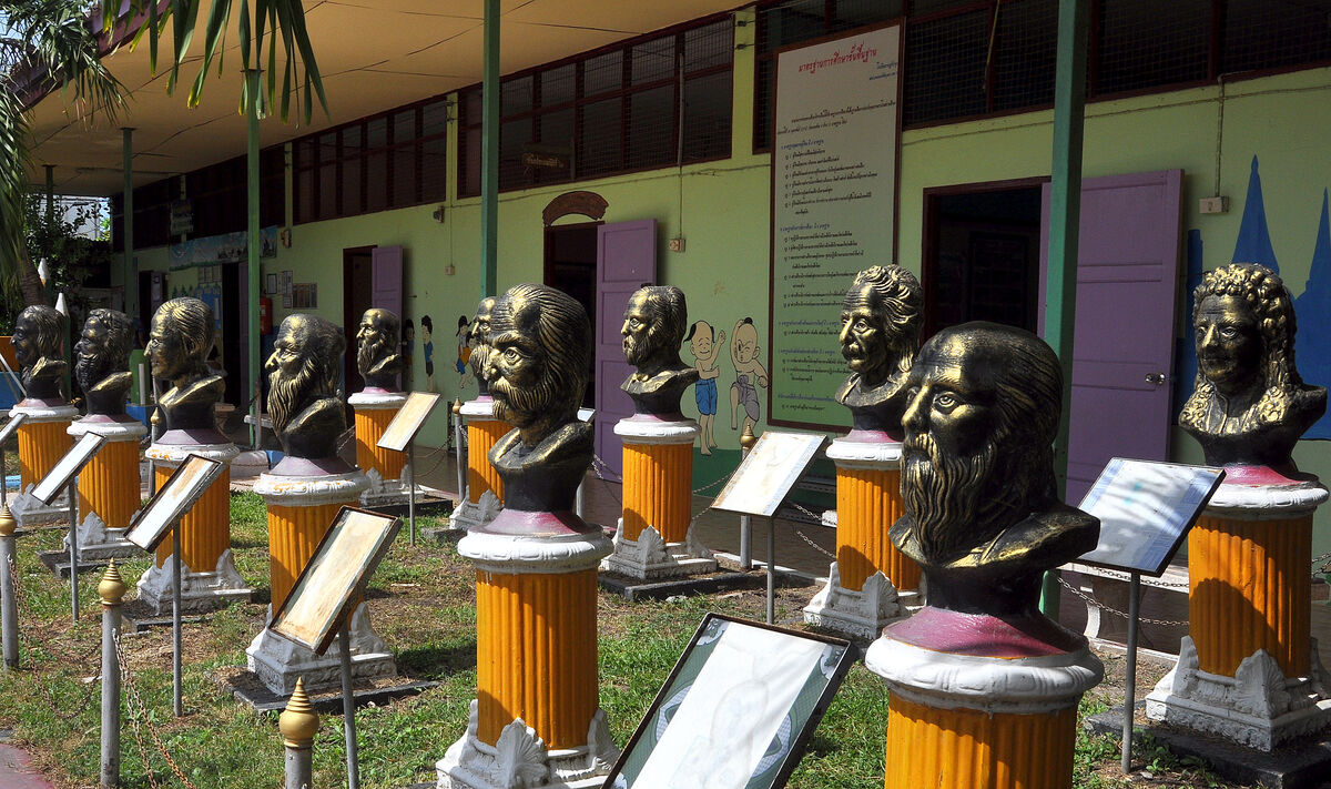 8 - In the school yard: Bronze busts of famous ind...