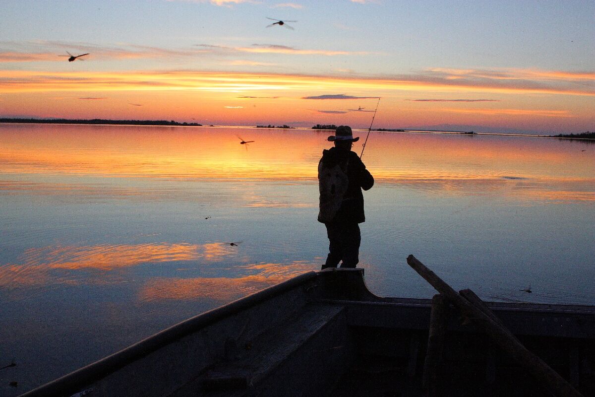 Fishing at midnight, Great Slave Lake NWT, Canada....