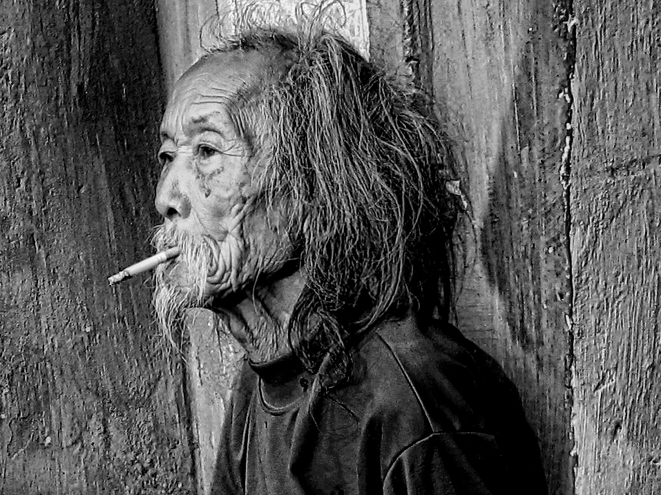 The old smoker hanging out in Hanoi...