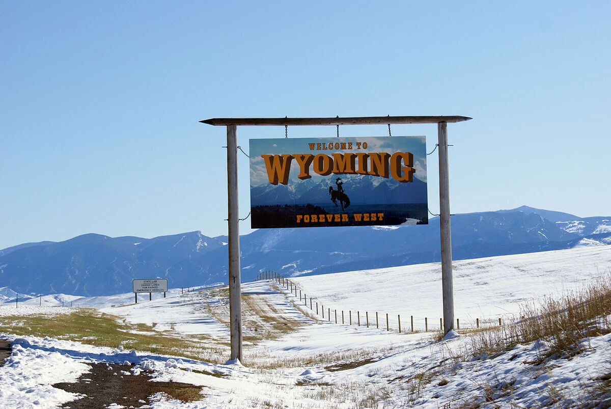 Sign on the Wyoming border crossing from Montana -...