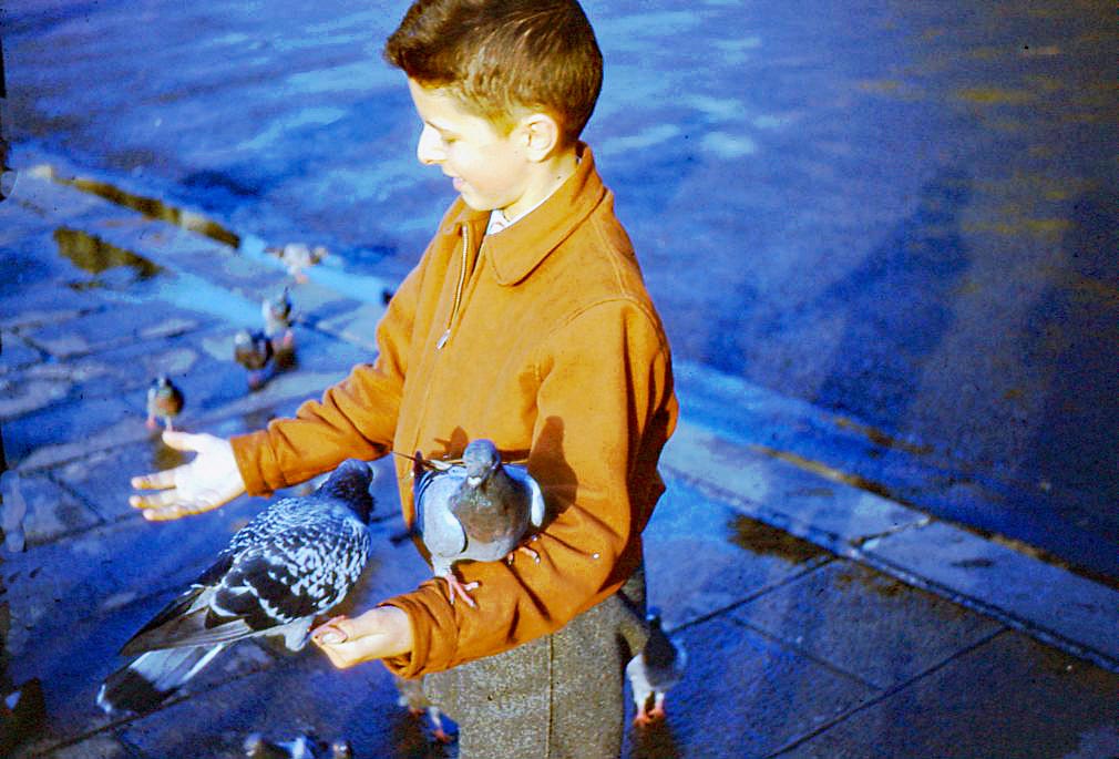 1965 Paris:  Feeding the pigeons....