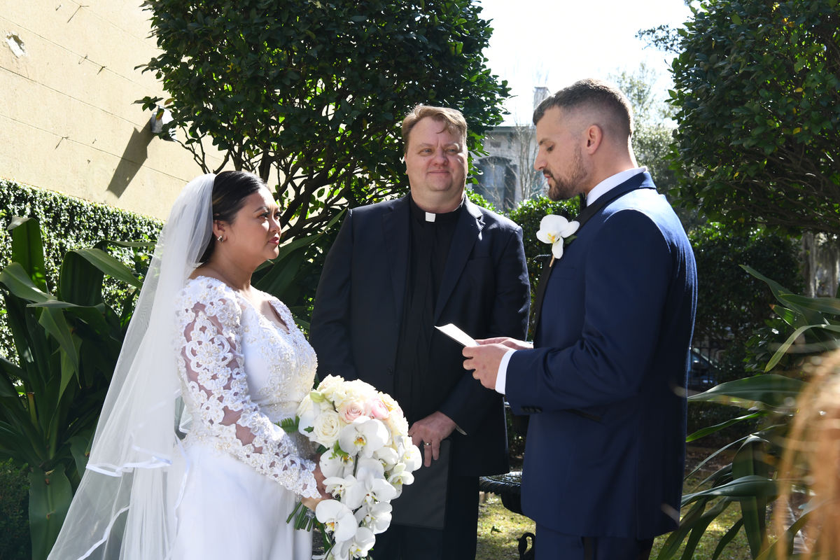 Michael reading his vows...