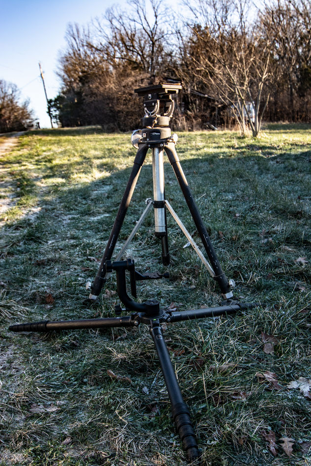Either tripod will handle that lens, but the one s...
