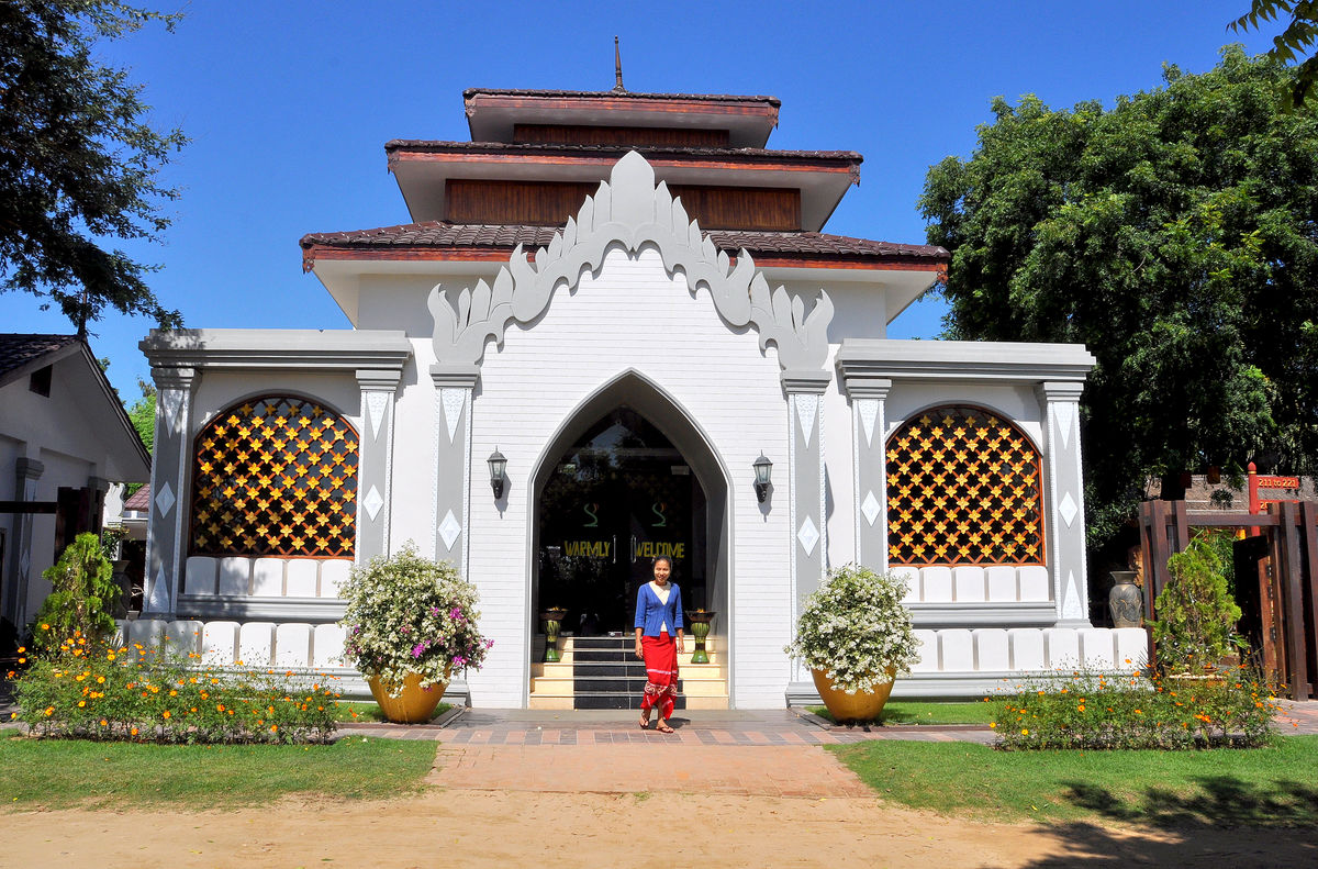 3 - One of the staff in front of the entrance to o...