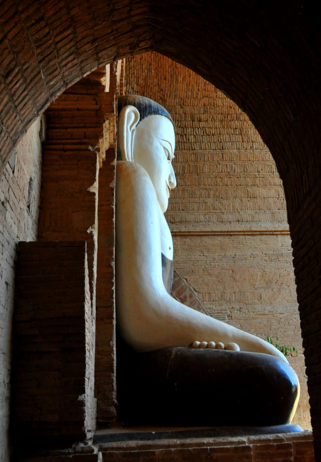 10 - Side/profile view of the sitting Buddha statu...