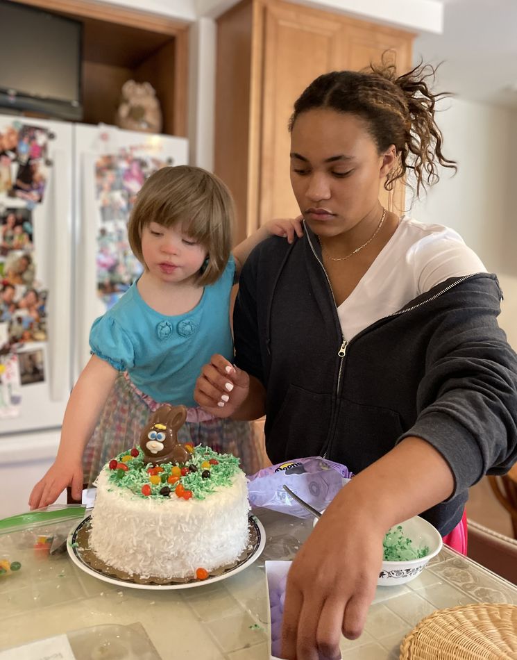 Nugget and cousin Breeana decorating the easter ca...