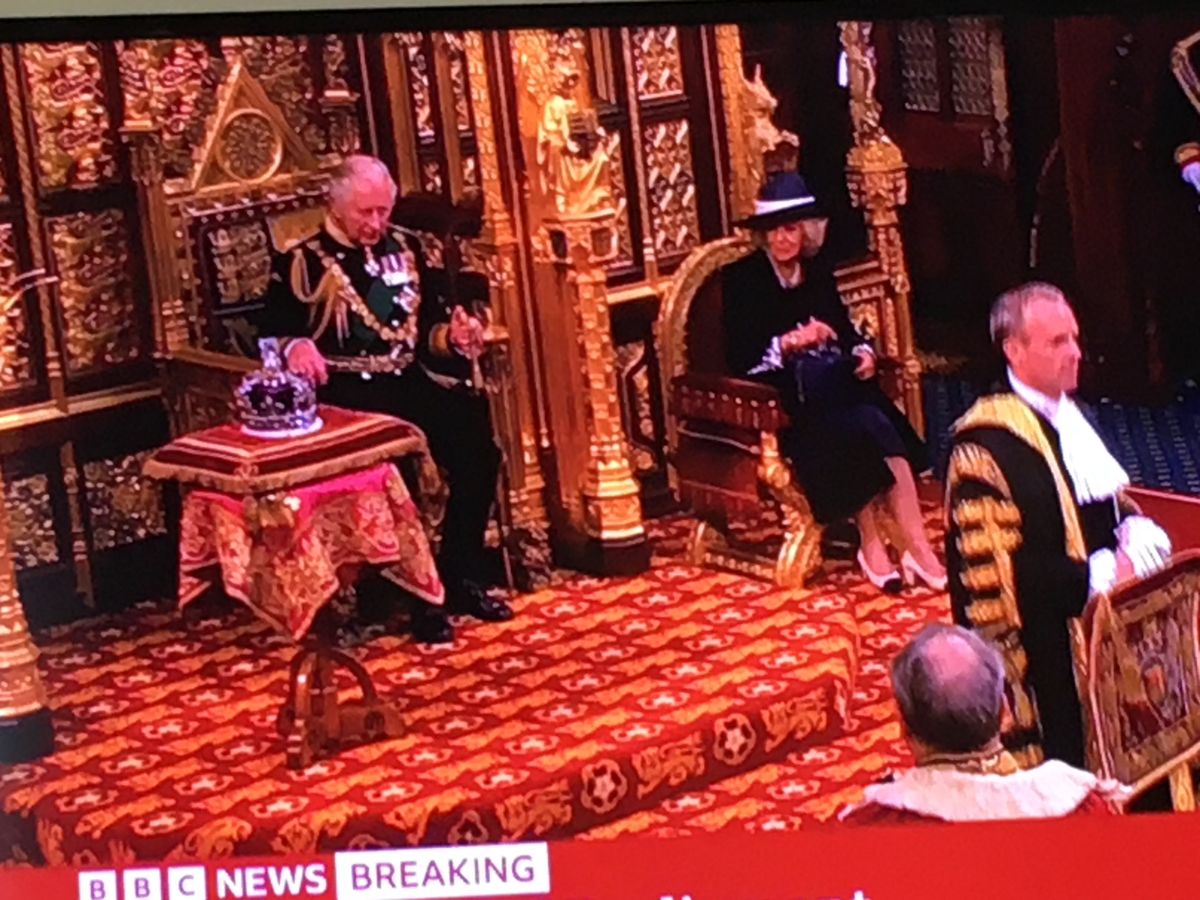 6. The Crown is placed beside Prince Charles....