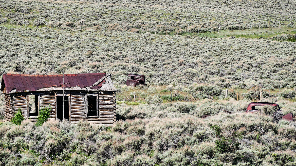 Almost Hidden In the Sagebrush.. An old log cabin and car remnants on ...