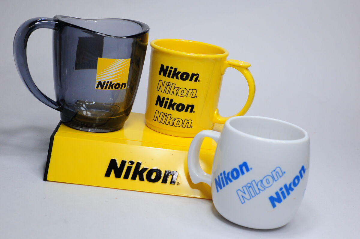 3 Nikon coffee mugs, SOLD SOLD SOLD 3 Nikon coffee mugs, yellow and
