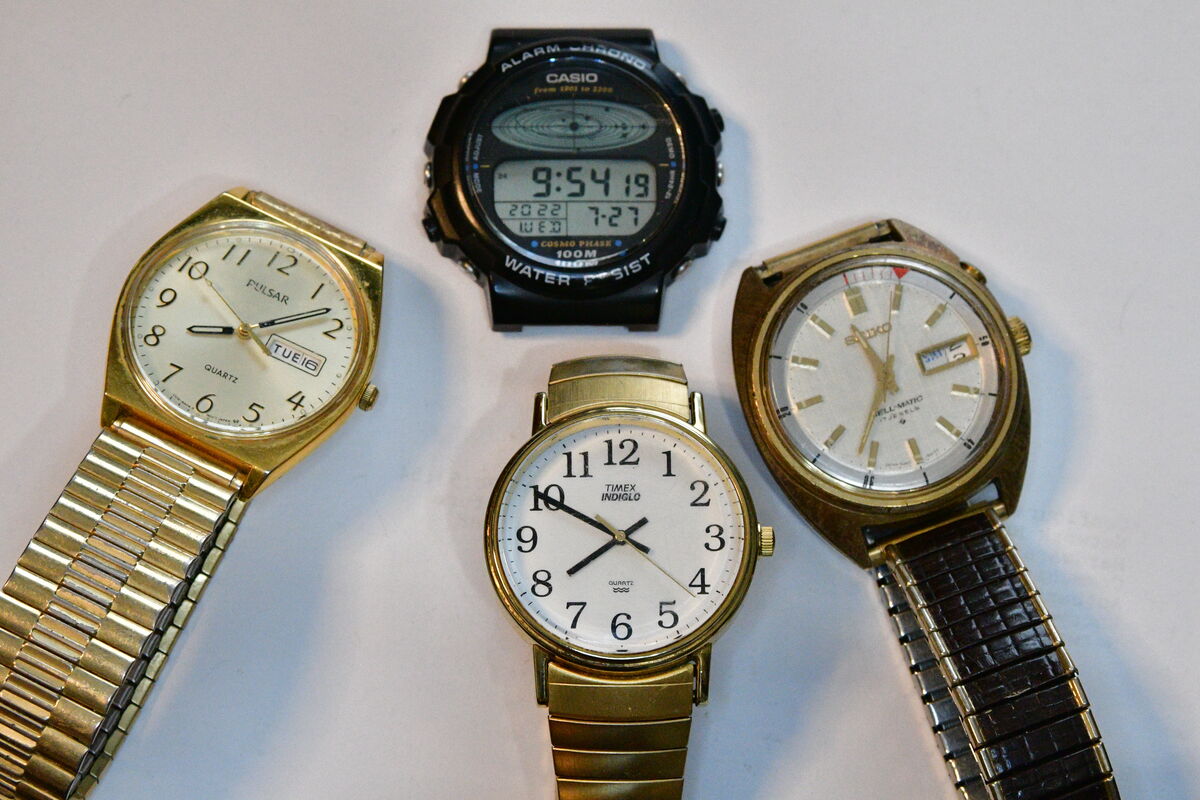 The top watch is a Casio solar system watch. The r...