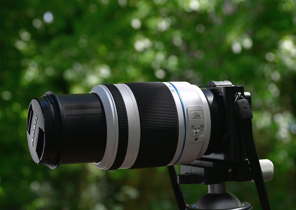 Samsung NX-1000 with 50-200mm OIS lens hanging in ...