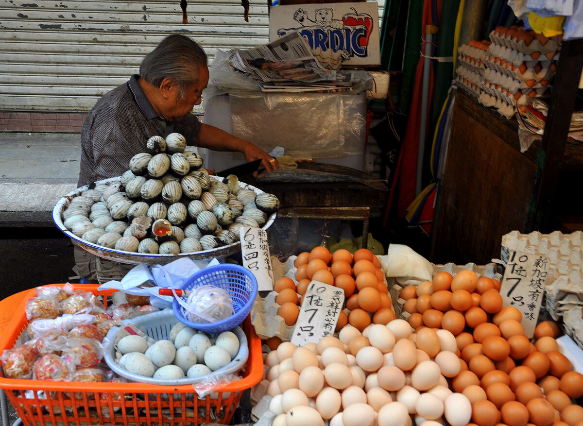 6 - Egg vendor with a variety of eggs...