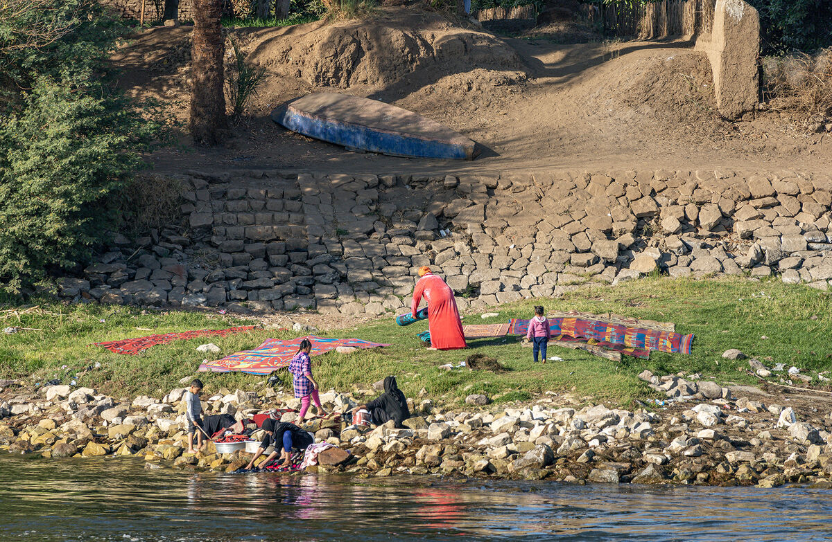 5.  Doing the family laundry on the river bank...