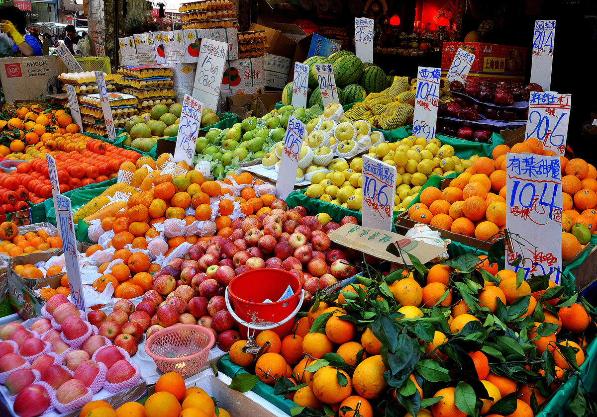 5 - Fruit in all shapes and colors, the market act...