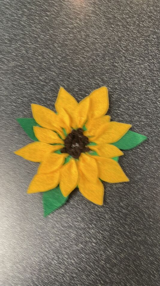 This is a felt sunflower.  I gave these & leaves a...
