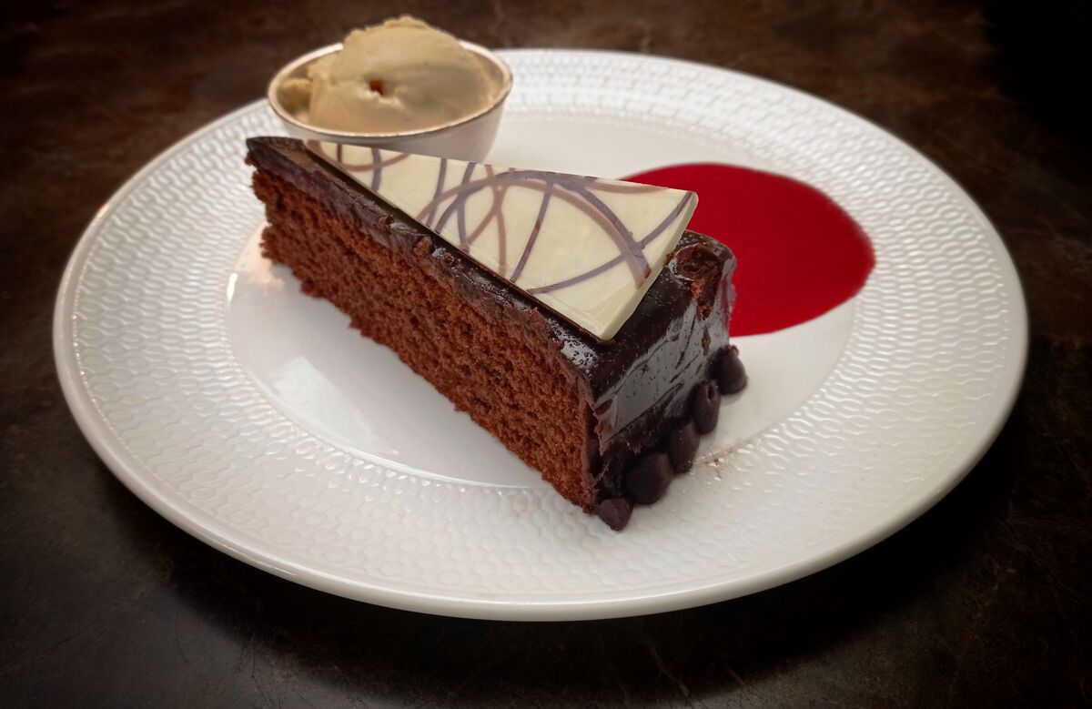 Chocolate Sachertorte, poached cherries and coulis...