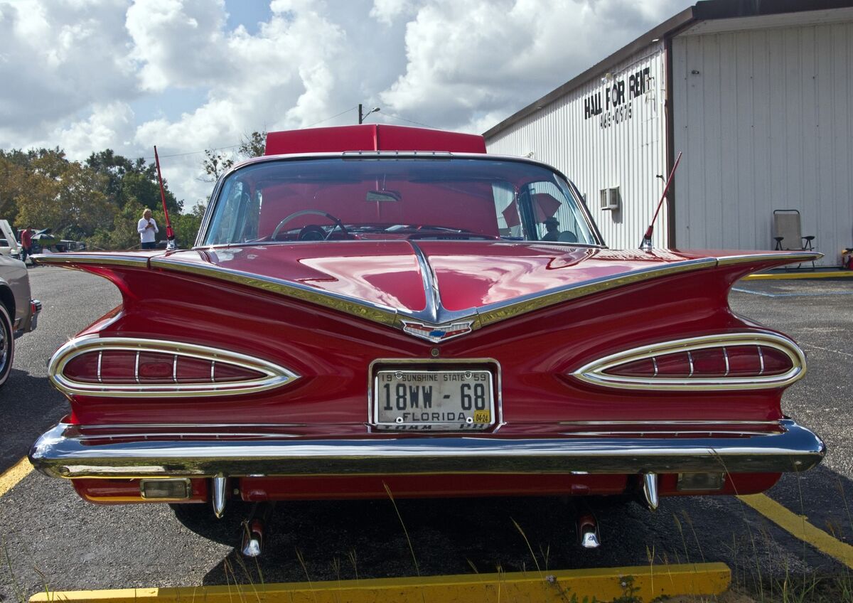 1959 Chevy Impala rear view - love those canted fi...