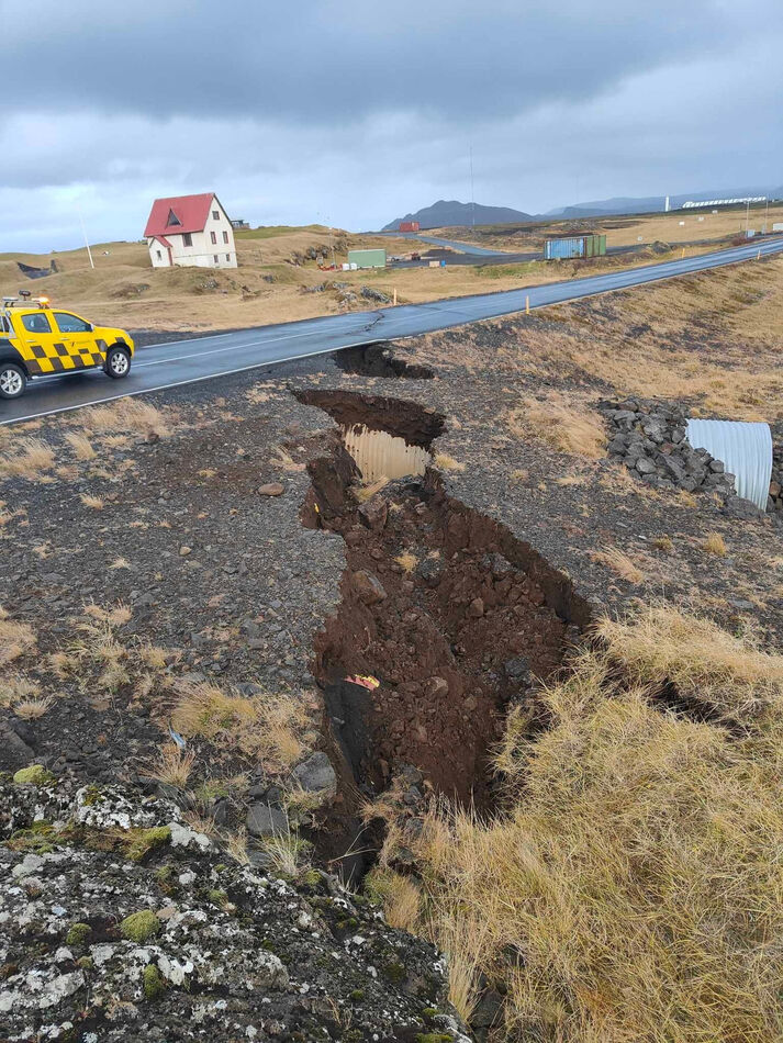 Cracks emerge on a road due to volcanic activity n...
