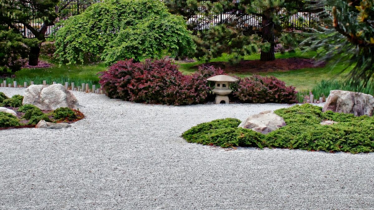 To the left of the entrance, a zen pond...