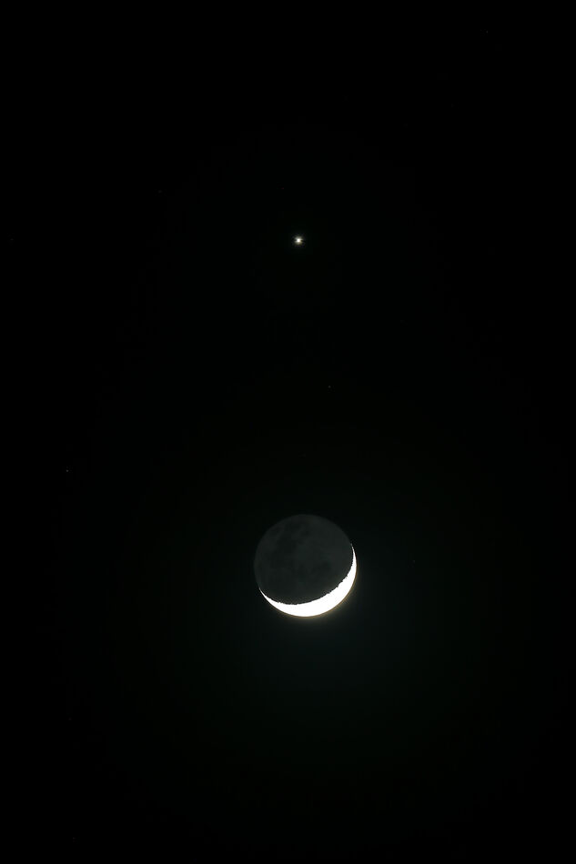 This 1/2 exposure brought out the earthshine. Take...