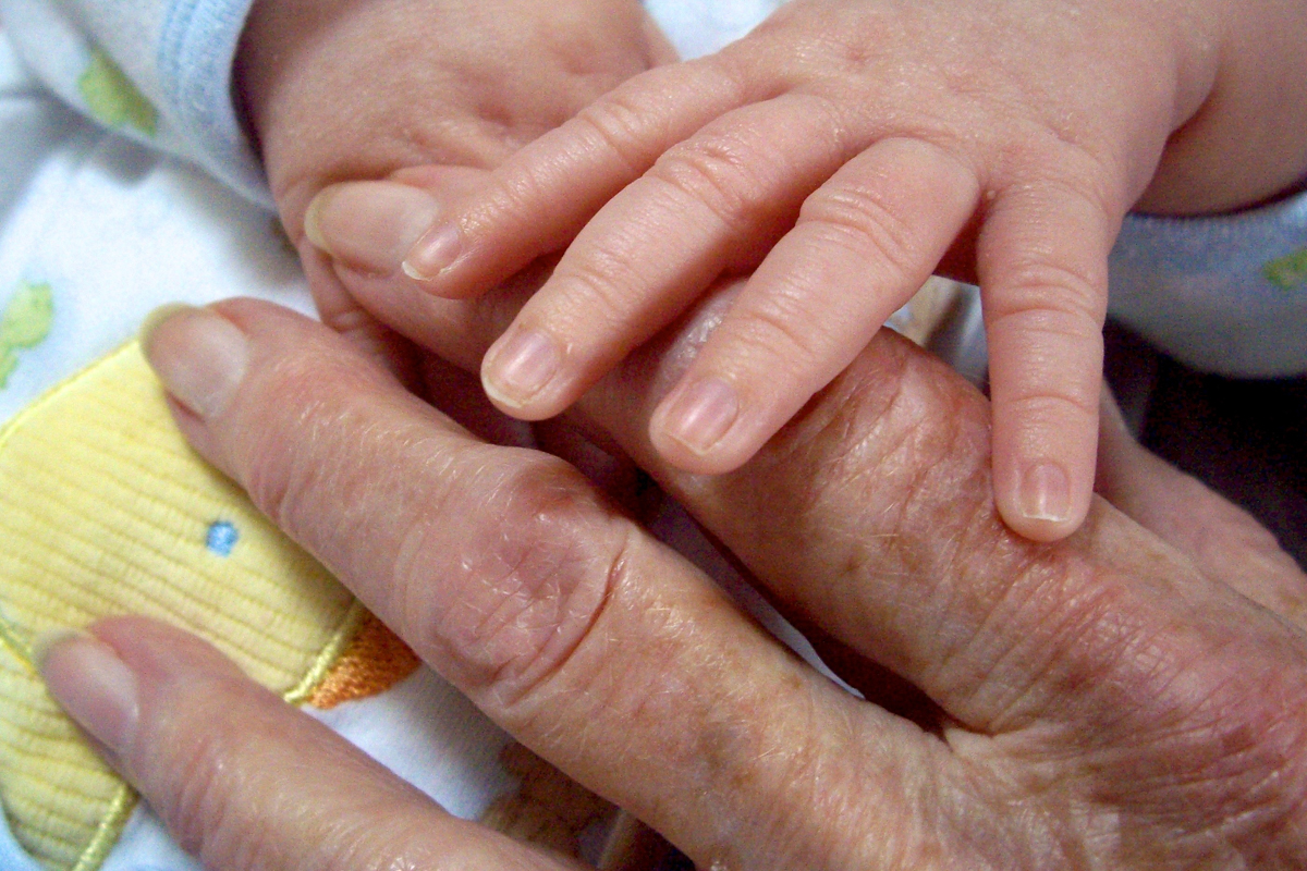 The hands of a newborn and his great grandmother...