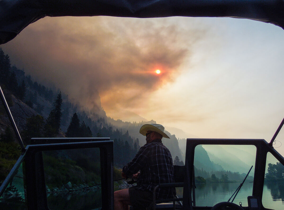Fishing during a forest fire...nothing will keep t...