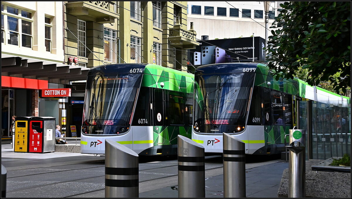 Two of Melbourne's trams in Bourke Street Mall....
