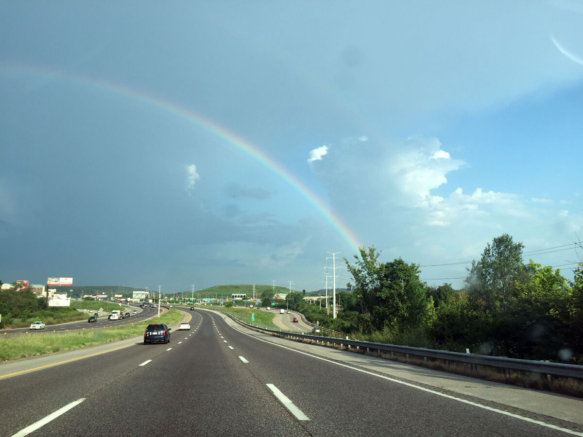 Rainbow over the highway near Fenton, Missouri - J...
