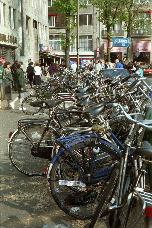 A row of bicycles on a street in Amsterdam, Hollan...