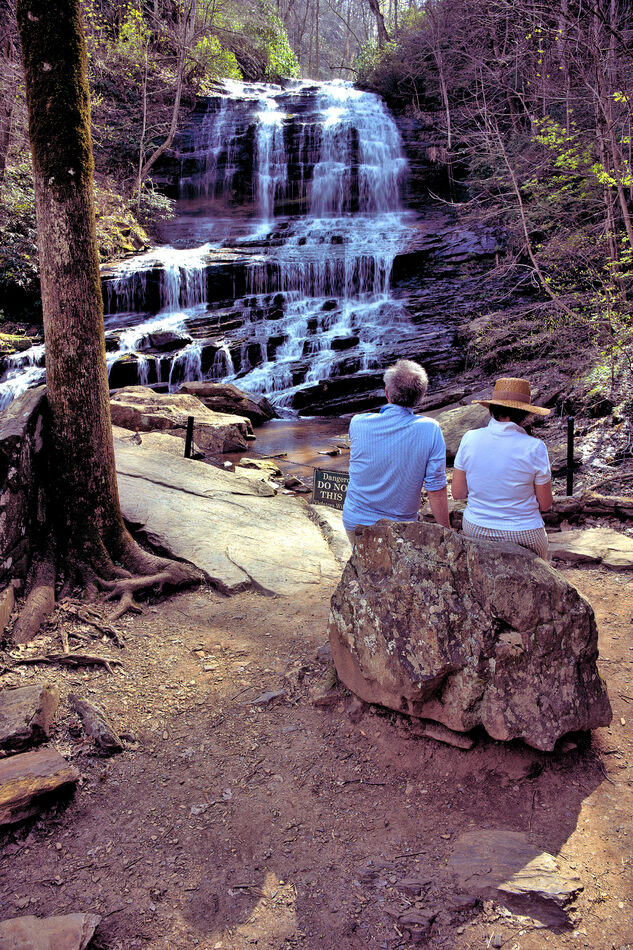 A couple view Pearsons Falls near Columbus, NC...