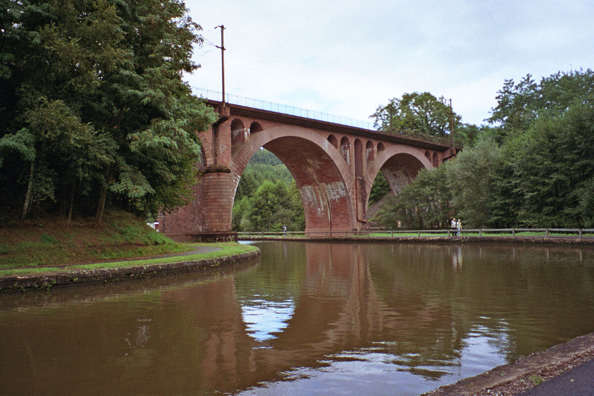 A railroad bridge over a canal in the Vosges Mount...