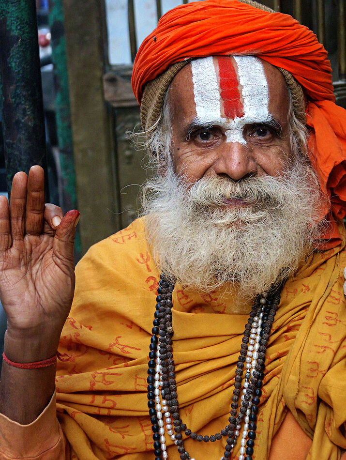 Another Sadhu.  I believe that hand sign means, "G...