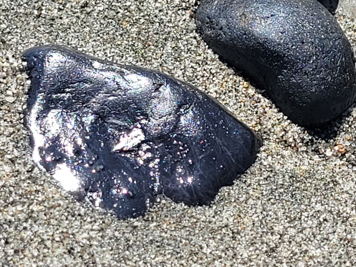 This looked like a piece of obsidian. I wondered i...