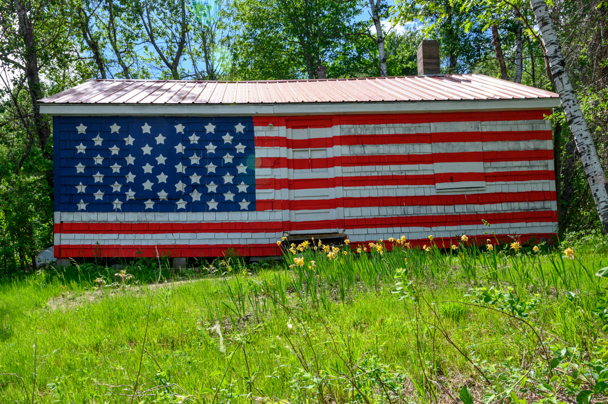 A house painted in flag"...