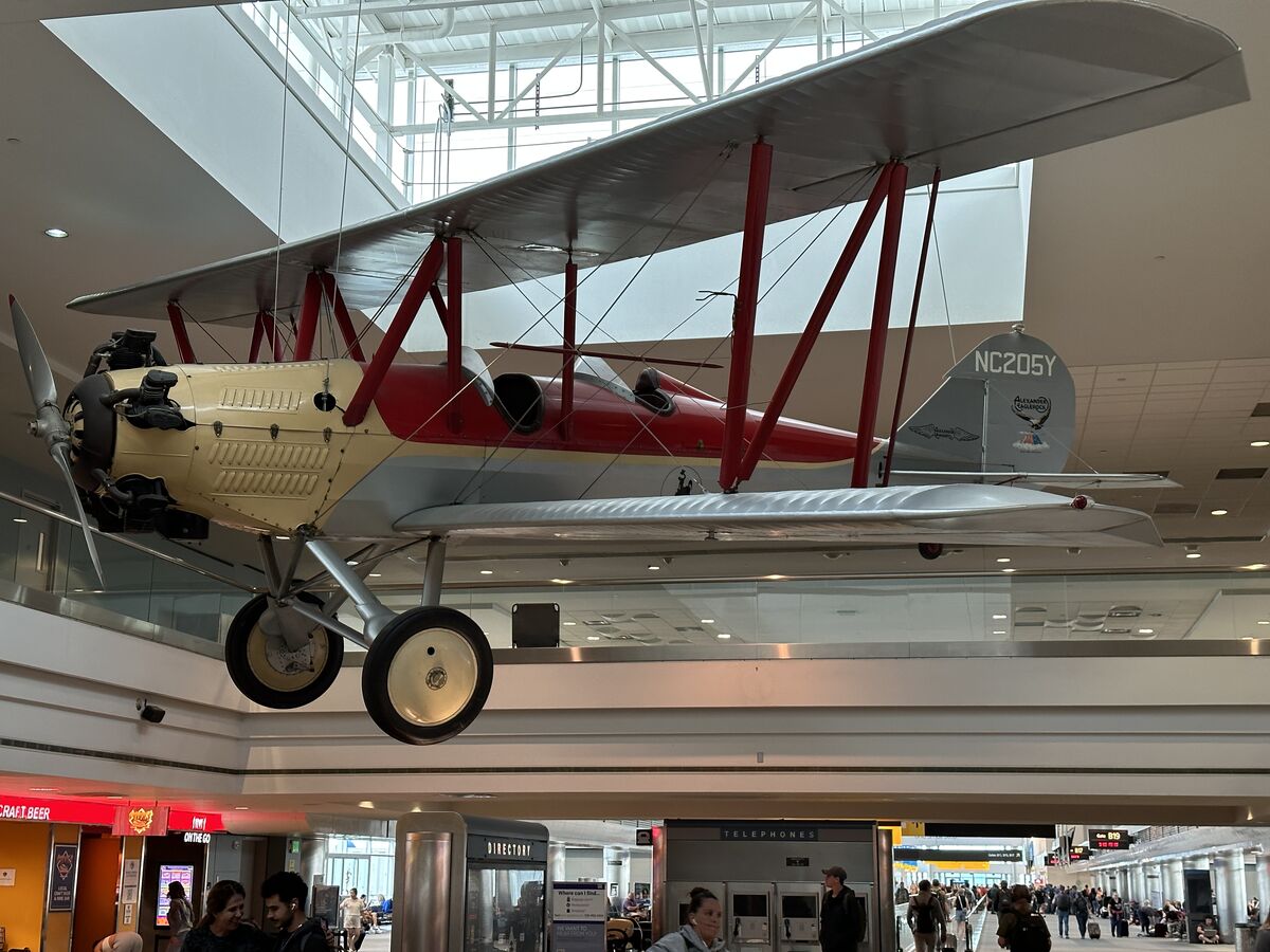 Second vintage aircraft hanging in the Denver airp...