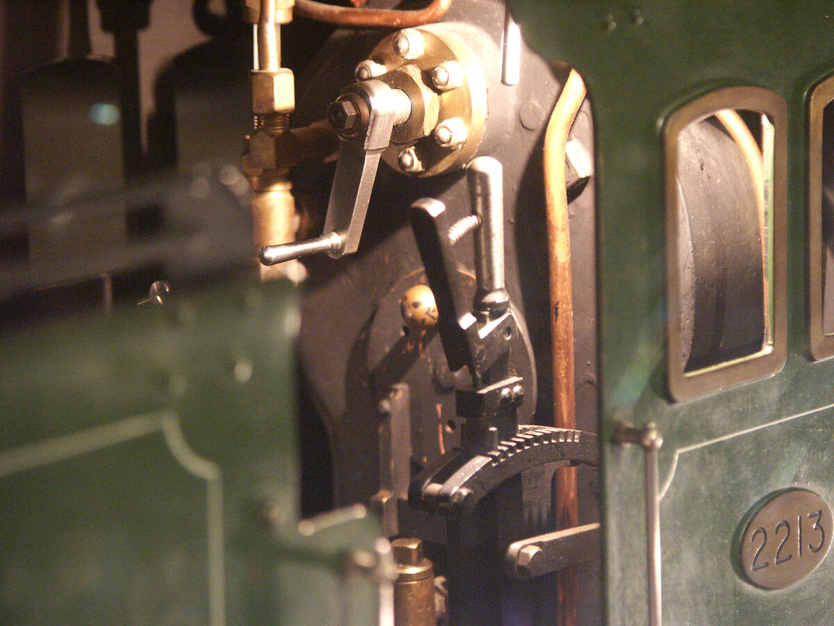 The throttle controls of a miniature steam engine ...