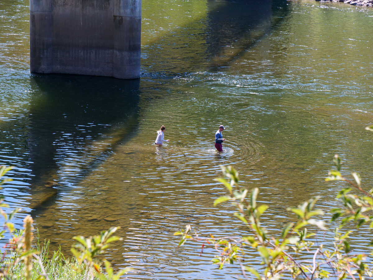 Nice to see a young couple enjoy fishing the river...