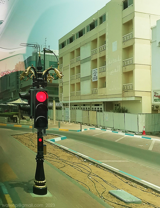 Al Ain has nice looking stop lights. The black lin...
