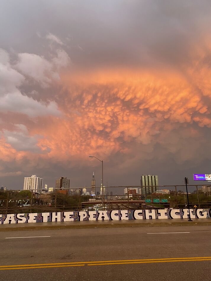 sunset reflected in the April storm clouds in Chic...