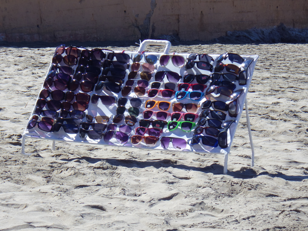 Sunglasses for sale on a Mexican beach...