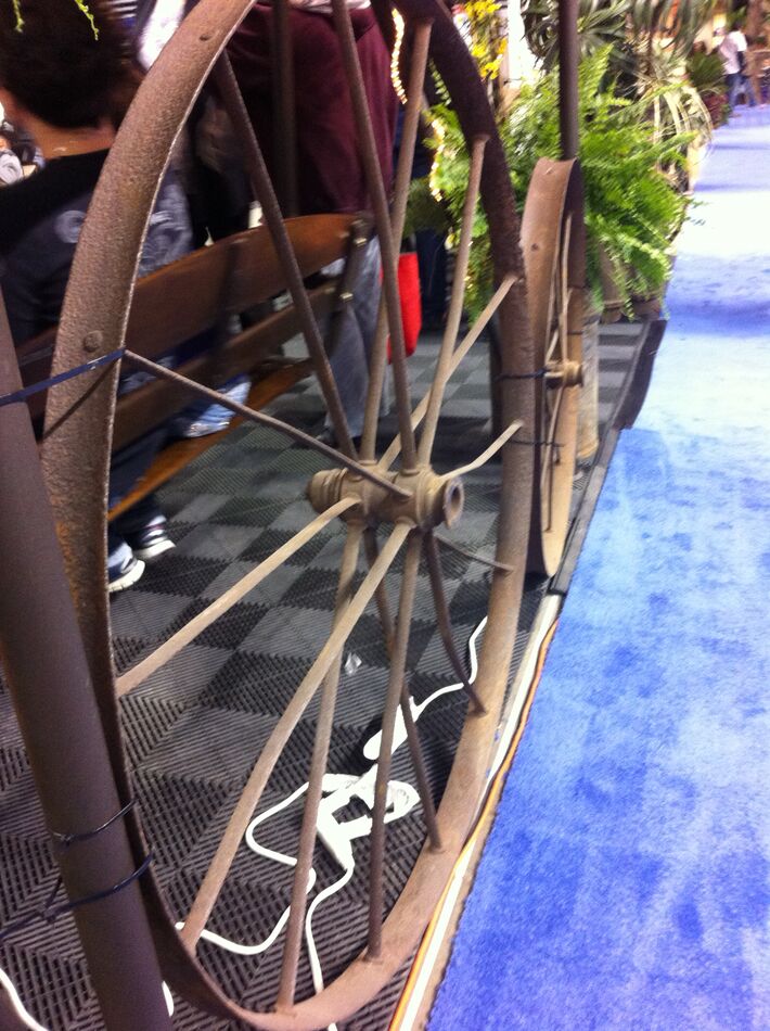 I saw these steel wheels decorating a booth at a c...
